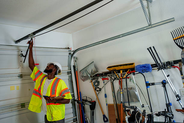 Professional Garage Door Panel Replacement technician working in North Plains, OR